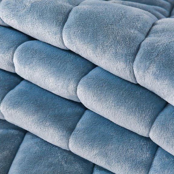 lichtblauwe fleece deken